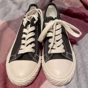 Black True Religion canvas shoes.